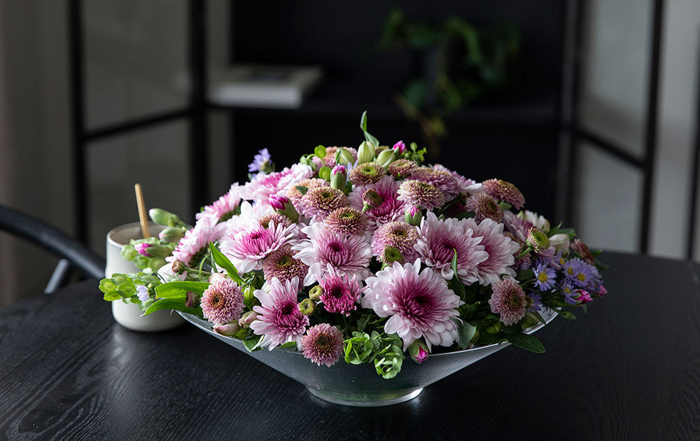 binderi_blomsterdekorasjon i roser_rosa og fersken_festbord binderi_blomsterdekorasjon i roser_rosa og fersken_festbord