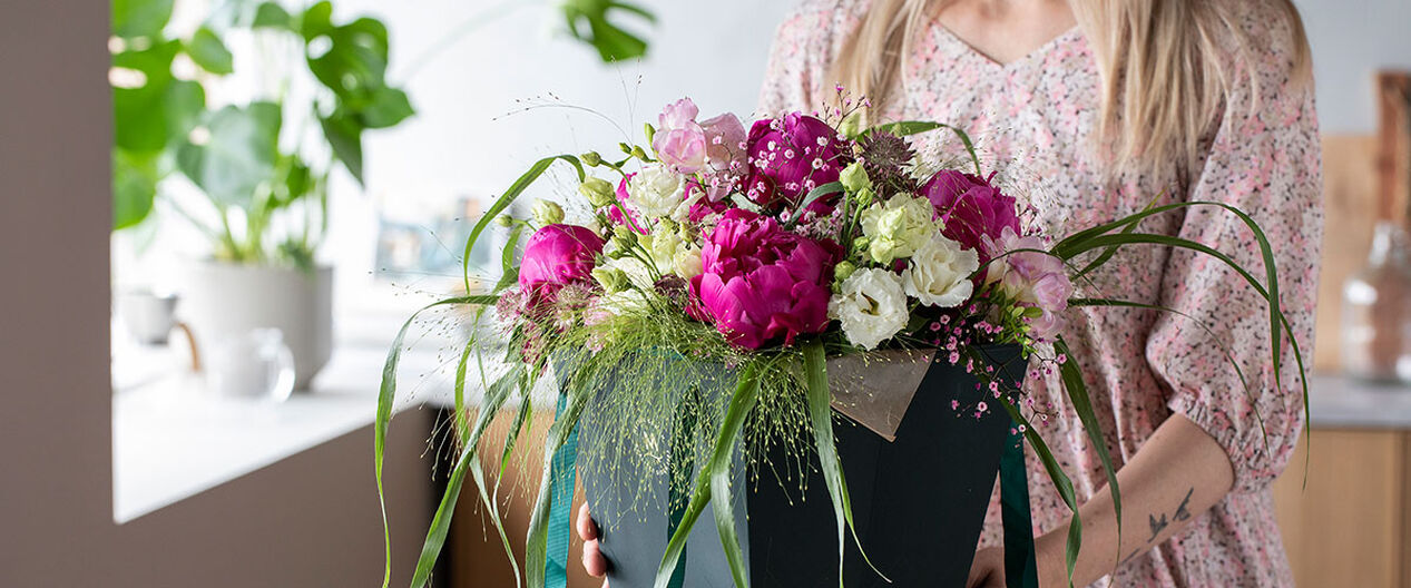 si takk med blomster